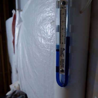 Radon system gauge installed by Green Earth Remediation to monitor residential mitigation efficacy.