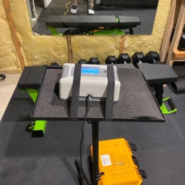 Detailed setup of Green Earth Remediation's radon testing gear ready for deployment in residential settings.