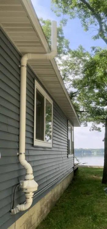 Radon mitigation system installed on home's exterior.